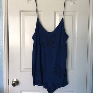 Dark blue romper with black embroidery